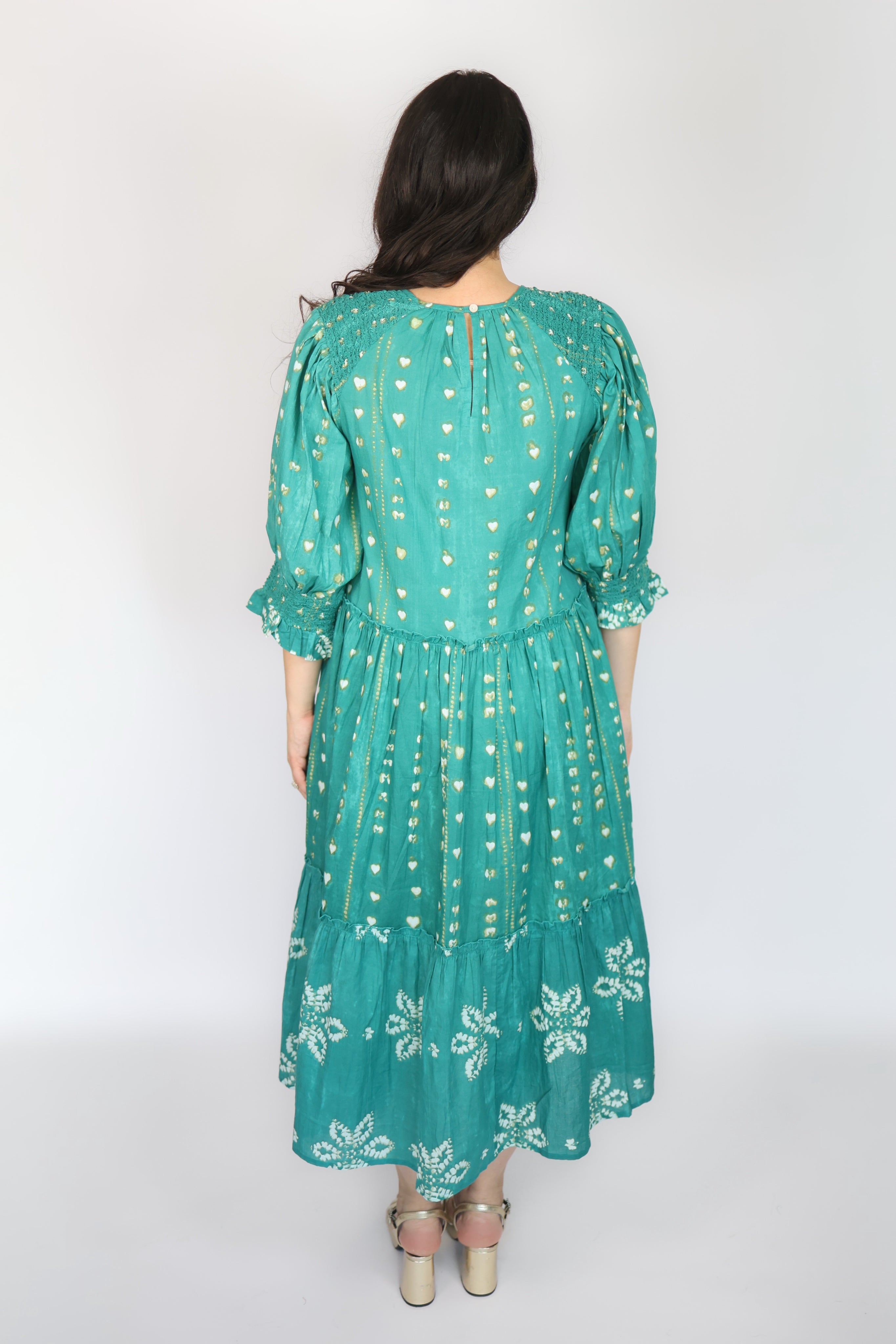 Vestido midi de jade con volantes en color esmeralda